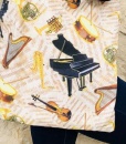 Taška s klavírem a notami detail